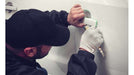 Knifeless Tape being applied to door handle before wrap. Photo courtesy of Desert Signs (desertsignsaz.com)