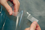 Using 3M Scotch tape with over laminate films.
