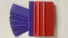 Monkey Strips used on the edge of economy squeegee to protect vinyl from scratches.
