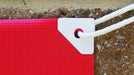 MINITABS White Adhesive Grommet Tabs. Photo courtesy of Banner Ups.